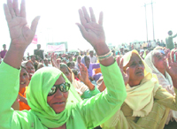 A large number of PoK refugees stage dharna at Indira Chowk in Jammu on Monday.