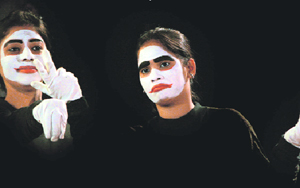 Girls perform on stage during a seminar on Women Day at the Gandhi Nagar College in Jammu on Monday.