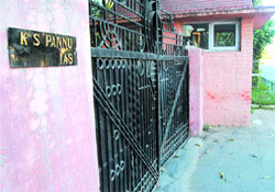 KS Pannus nameplate at the residence.