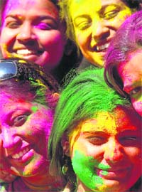 HOLI HUES: Students have fun with colours on the Holi eve in Chandigarh