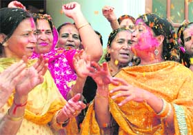 Women celebrate Holi with flowers in Mohali