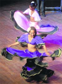 A music group from Mauritius performs saga dance during a show at Tagore theatre, Chandigarh