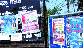 BSP posters pasted on boards outside the District Administrative Complex are a direct violation of the election code of conduct.