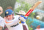 Virender Sehwag clobbers one during training.