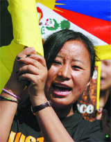 Tibetan activists protest against China outside the United Nations (UN) Regional Headquarters to mark the 50th anniversary of the Tibetan uprising in New Delhi on Thursday.