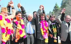 PDP patron Mufti Mohammad Sayeed poses with NC leader Sheikh Mohd Rafiq and others who joined the party in Srinagar on Thursday.