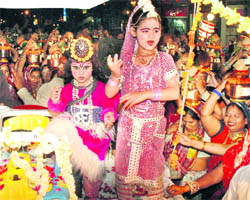 Child artistes present an item during the Shyam Basant Mahotsava in Gurgaon on Friday.