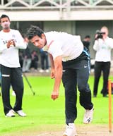 Irfan Pathan bowls in the nets ahead of their final one-day international cricket match in Auckland