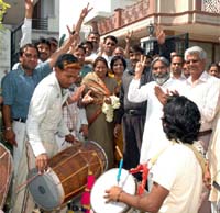 Supporters of BJP candidate Sudha Yadav celebrate after she got ticket from Gurgaon parliamentary seat