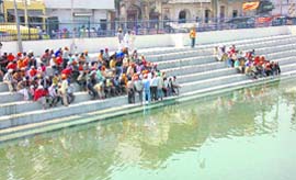 Pilgrims at the Darbar Sahib sarovar.