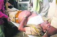 Havildar Arjun Singh is taken to hospital at Nangal Pathani, near Rewari