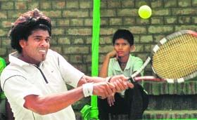 Vishnu Vardhan of India in action during a match against fourth seed Patrick Taubert of Germany at Tennis Stadium, Sector 10, Chandigarh