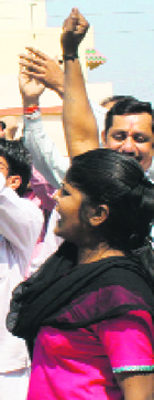 Congress activists protest against the Mayor in Dehradun on Monday.