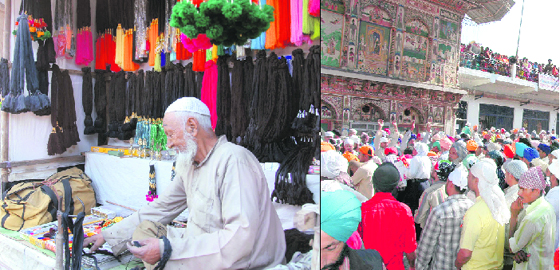 A shopkeeper makes colourful parandas to sell these at Jhanda Mela, Guru Ram Rai Darbar; and right: a sea of humanity at the mela in Dehradun.