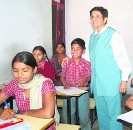 Dr Kiran Bedi at Citizen Forum Vidya Mandir School in Maqboolpura, Amritsar, on Monday. 