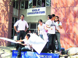 Students of the School of Communication Studies before the beginning of rally for Soch