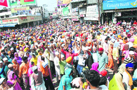 Devotees on a parikrama of the old areas of Dehradun on Tuesday.