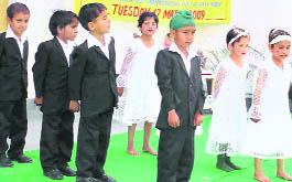 Tiny tots present an item during the annual function of Gilly Mundi Memorial Community School at Leharian in Fatehabad on Tuesday.