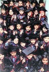 Children pose after the graduation ceremony at BCM Arya Model Senior Secondary School in Ludhiana on Tuesday.