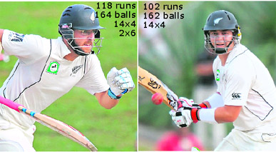 New Zealand captain Daniel Vettori (L) runs, while Jesse Ryder plays a shot during the first day of the first Test between India and New Zealand at Sedonn Park stadium in Hamilton on Wednesday.