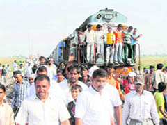 Residents block rail traffic in protest against the alleged arrest and beating up of a sarpanch by the police near Ismaila village on Thursday.
