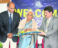 Renowned Dogri writer Ved Kumari Ghai is felicitated in Jammu on Thursday. 