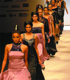 Models showcase the creations of designers Shyamal and Bhumika on the third day of Delhi Fashion Week on Saturday: