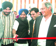 Deputy Chief Minister Sukhbir Singh Badal, along with BJP MP Navjot Singh Sidhu, inaugurates the first five-star hotel in Amirtsar on Saturday.