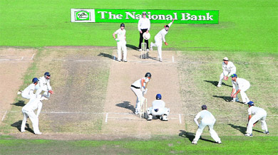 Harbhajan Singh bowls to the last New Zealand batsman Chris Martin during the fourth day of the first Test at Seddon Park in Hamilton on Saturday.