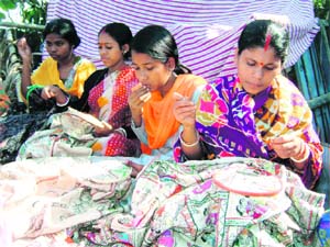 Women doing kantha work at Sahapara in South 24 Parganas district of West Bengal