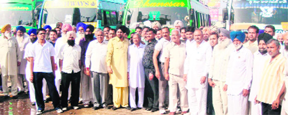 Commission agents and farmers leave for Bathinda from grain market at Ahmedgarh on Sunday.