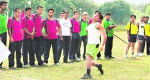 A participant throws a javelin at the Annual Sports Meet of FRI University in Dehradun on Monday.