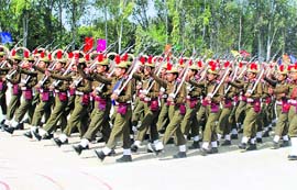 Women police recruits take part in a passing-out parade at the Haryana Police Academy in Madhuban on Monday. As many as 565 recruits completed their training. 