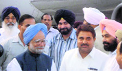 Prime Minister Manmohan Singh being received by leaders at the Rajasansi International Airport in Amritsar on Monday.