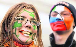 Irish expatriates and Russian devotees celebrate the St. Patricks Day in central Moscow on Sunday.  AP
