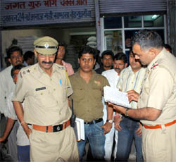 Unidentified men on Monday night robbed a grain trader at gunpoint on Khand Road Anaaj Mandi in Gurgaon.