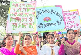 Trainee nurses take out a procession on the occasion of World Tuberculosis Day at Dharamsala