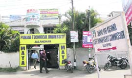 The rented accomodation in Jammu which is shared by a private educational institute with the SHRC, overshadowing the commissions office. 