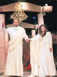 Kabir Bedi and Dimple Kapadia on the ramp as the "King and Queen" of Valaya's "Kingdom Of Love" (the name of his collection). Photo: PTI