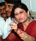 Former Haryana Deputy CM Chander Mohan, alias Chand Mohammads, ex-partner Anuradha Bali, alias Fiza, addresses a press conference in Gurgaon