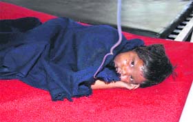 An injured girl at the Civil Hospital at Ludhiana