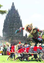 devils show: Hindu devotees play 'Ogoh-Ogoh', considered a symbol of modes of nature that form the malicious characters of living beings, during a traditional ceremony ahead of Silence Day at Prambanan temple in Sleman, Indonesia, on Wednesday.