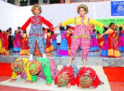 Schoolchildren present an item during the annual prize distribution function at Ryan International School, Sector-40, Gurgaon, on Thursday.
