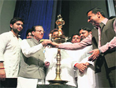 State Congress chief Saif-ud-Din Soz lights the lamp to declare the state-level NSUI convention open at Jammu University on Thursday.