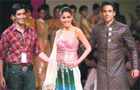 Bollywood actors Genelia D'Souza (centre) and Tushar Kapoor (right) along with designer Manish Malhotra during LFW