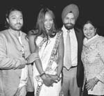 Super model Naomi Campbell with hotelier Sant Singh Chatwal and his family at the Lakme Fashion Week & Vogue India party in Mumbai 