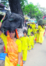 Devotees arrive in Kangra town to pay obeisance at the Bajjreshwari temple on Sunday.