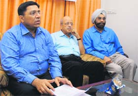 Honorary secretary, IMA, Dr Dharam Parkash (centre) with state IMA chief Dr Yash Sharma (left) and Dr Jasdeep Singh in Ludhiana