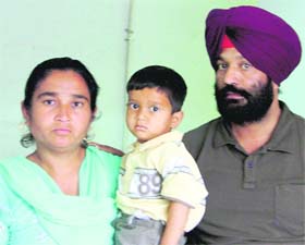 Smilepreet with his parents in Ludhiana