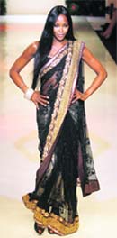 Supermodel Naomi Campbell takes part in the Mai Mumbai fashion show during the second day of the Lakme Fashion Week in Mumbai